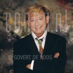 19-02-1997 Benny Neyman at studio in Amsterdam.

[keywords]Posed, Half Length, Eyecontact, Smiling[/keywords]